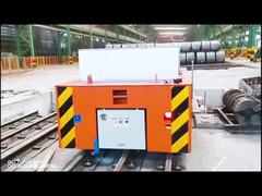 Low voltage rail electric flat car: reliable solution for heavy load and high frequency conditions